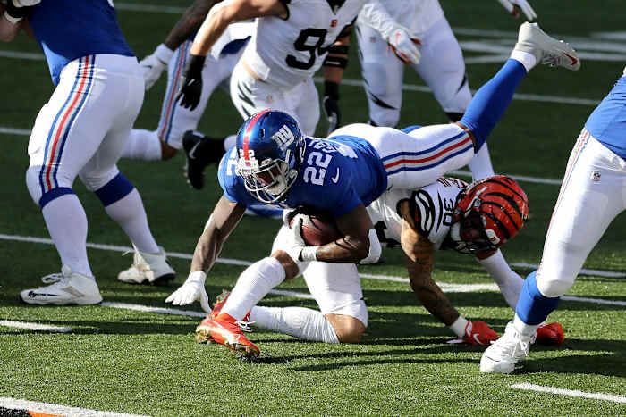 Cincinnati Bengals cornerback William Jackson (22) is upended stretching for the goal line by Cincinnati Bengals free safety Jessie Bates (30) in the first quarter during an NFL Week 12 football game, Sunday, Nov. 29, 2020, at Paul Brown Stadium in Cincinnati.